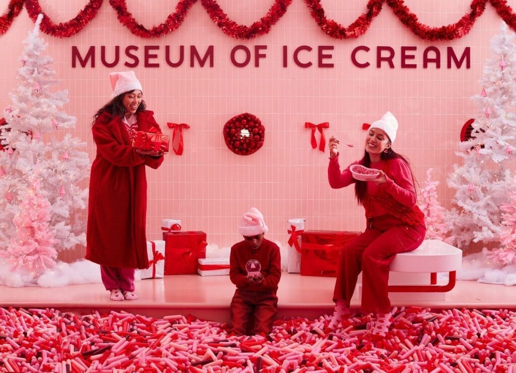 Friends enjoying MUSEUM OF ICE CREAM Pinkmas celebration