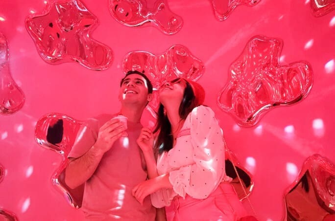 Couple enjoying a fun date at Museum of Ice Cream Chicago
