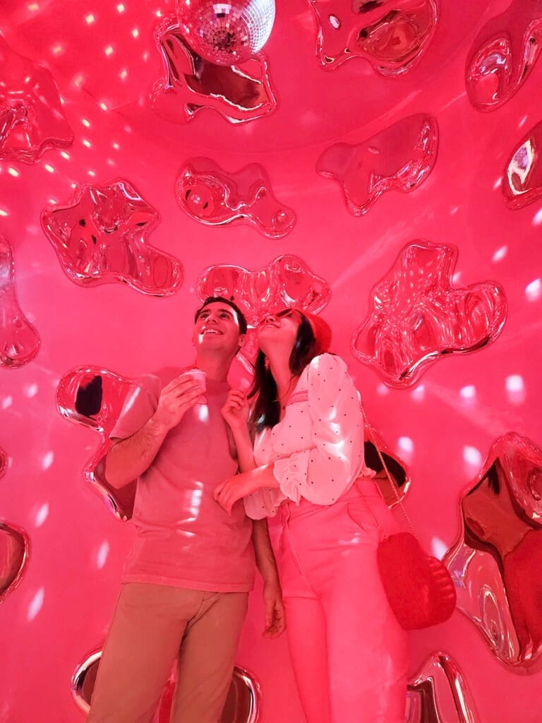 Couple enjoying a fun date at Museum of Ice Cream Chicago