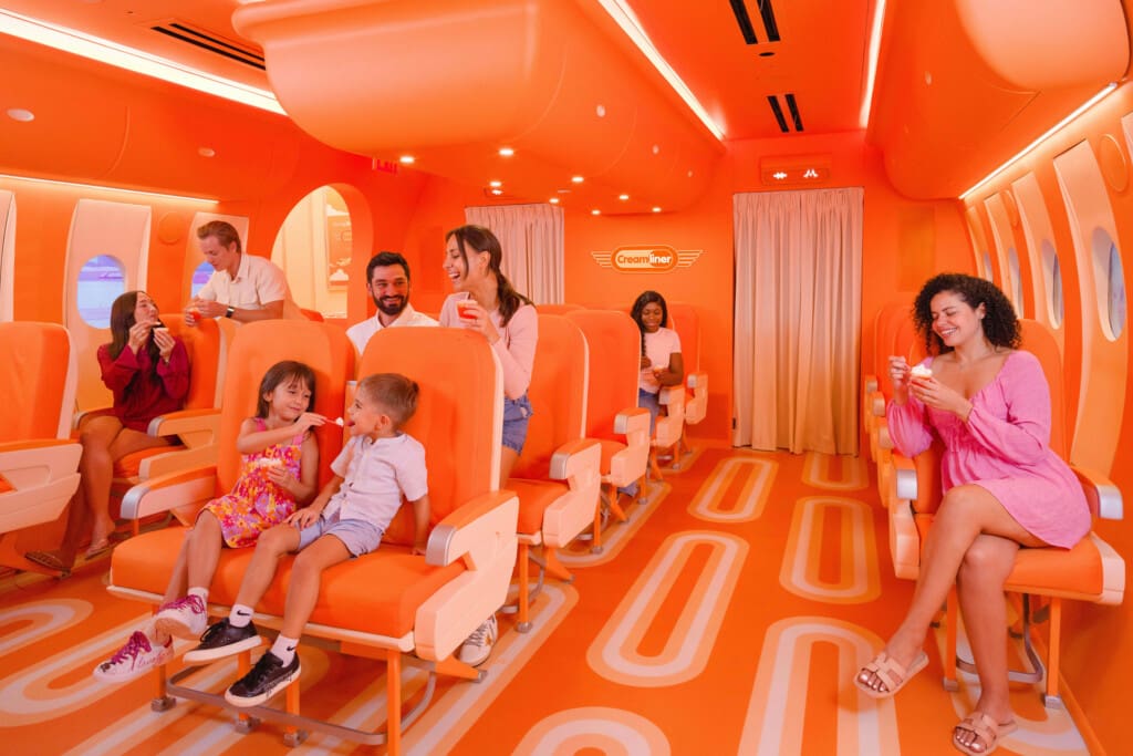 Kids exploring a playful pink kitchen at Museum of Ice Cream Chicago