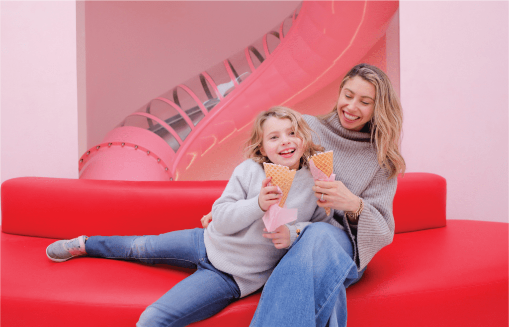 mom and child enjoying ice cream at Museum of Ice Cream