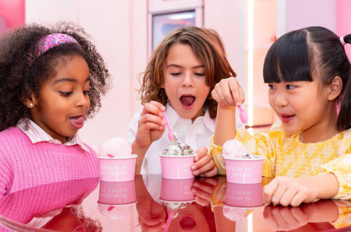 Kids tasting ice cream at Museum of Ice Cream