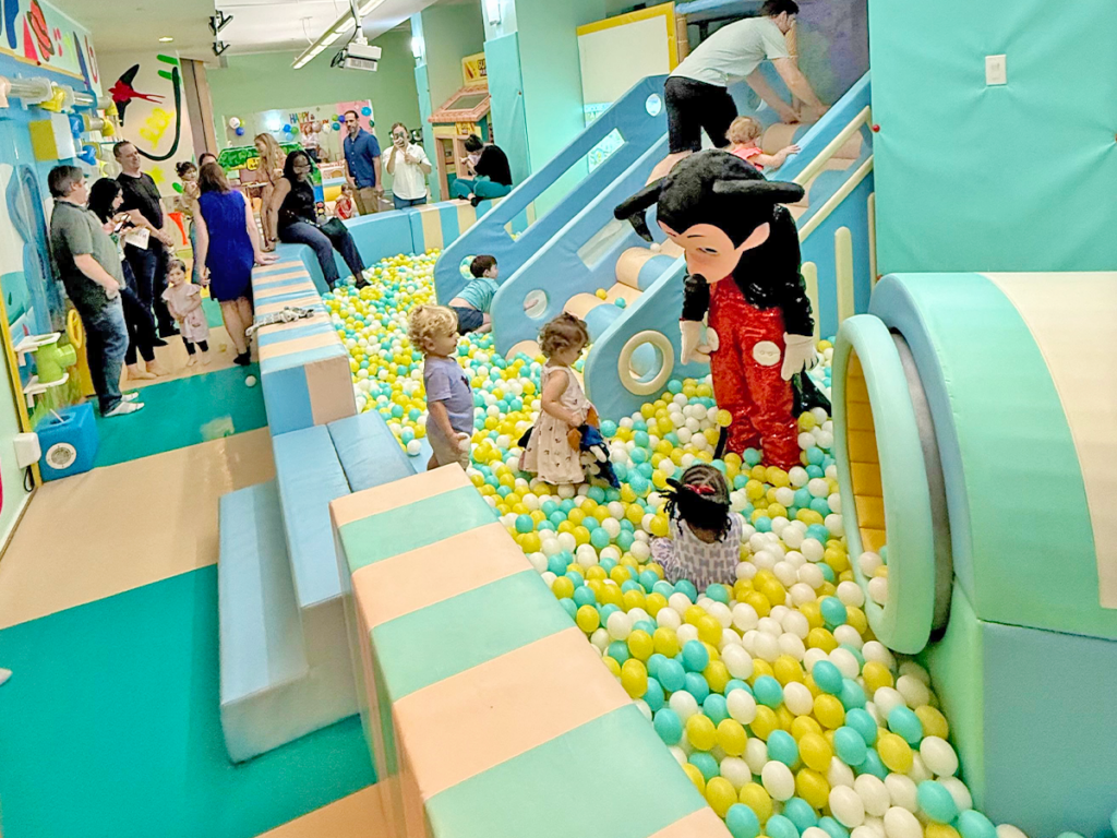Kids playing in the ball pit at Golden Minds Playground