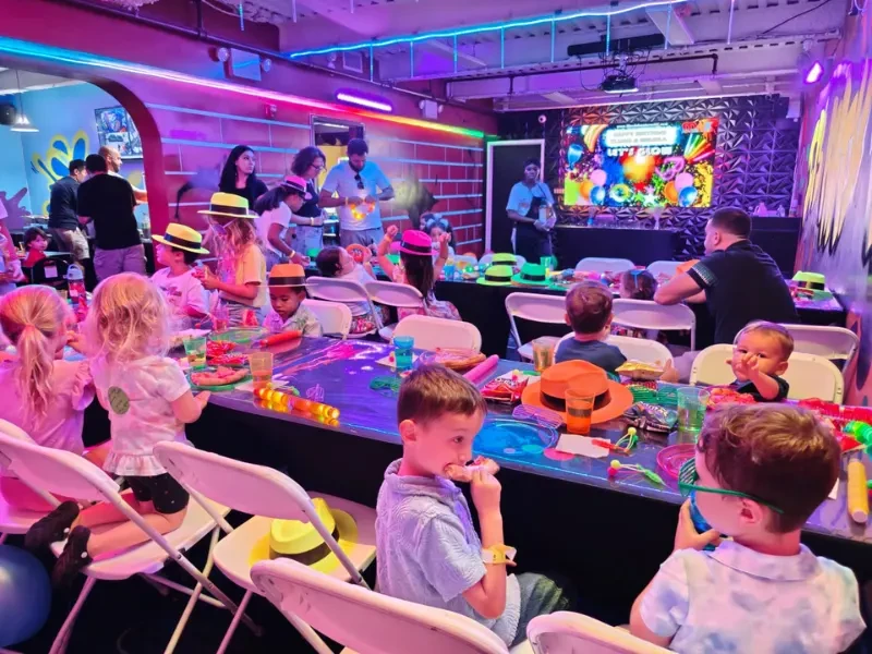 Kids birthday party in the glow room at Max Adventures