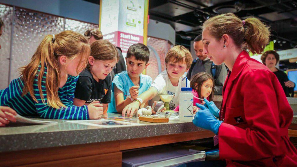 Kids doing a science activity at the Museum of Science