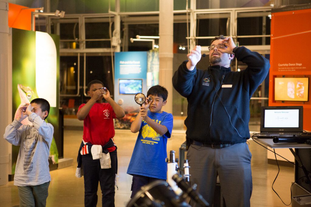 Kids learning with telescopes at California Science Center