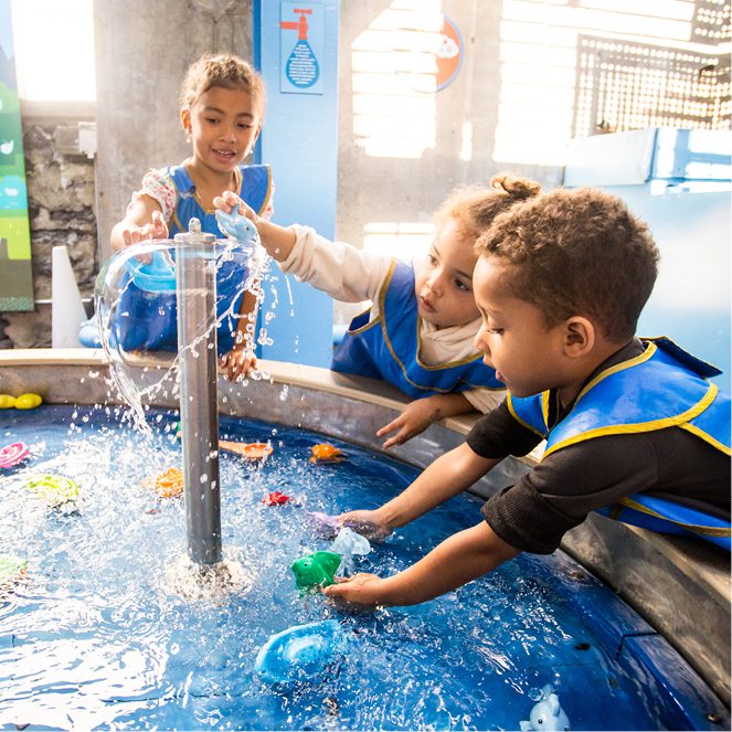 Kids playing with water exhibits at Children’s Museum of Manhattan.