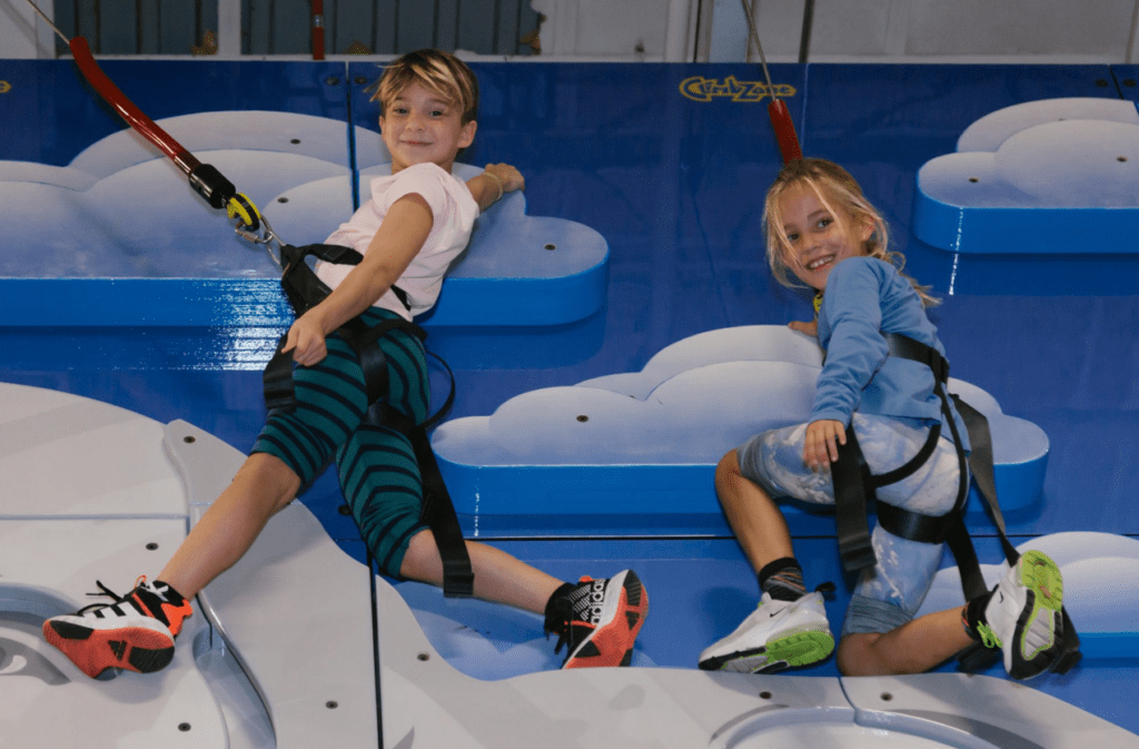 Kids climbing a cloud wall at ClimbZone