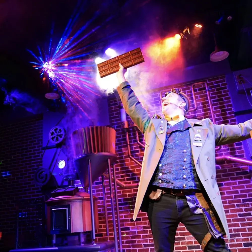 Performer holding chocolate at Hershey's Chocolate World