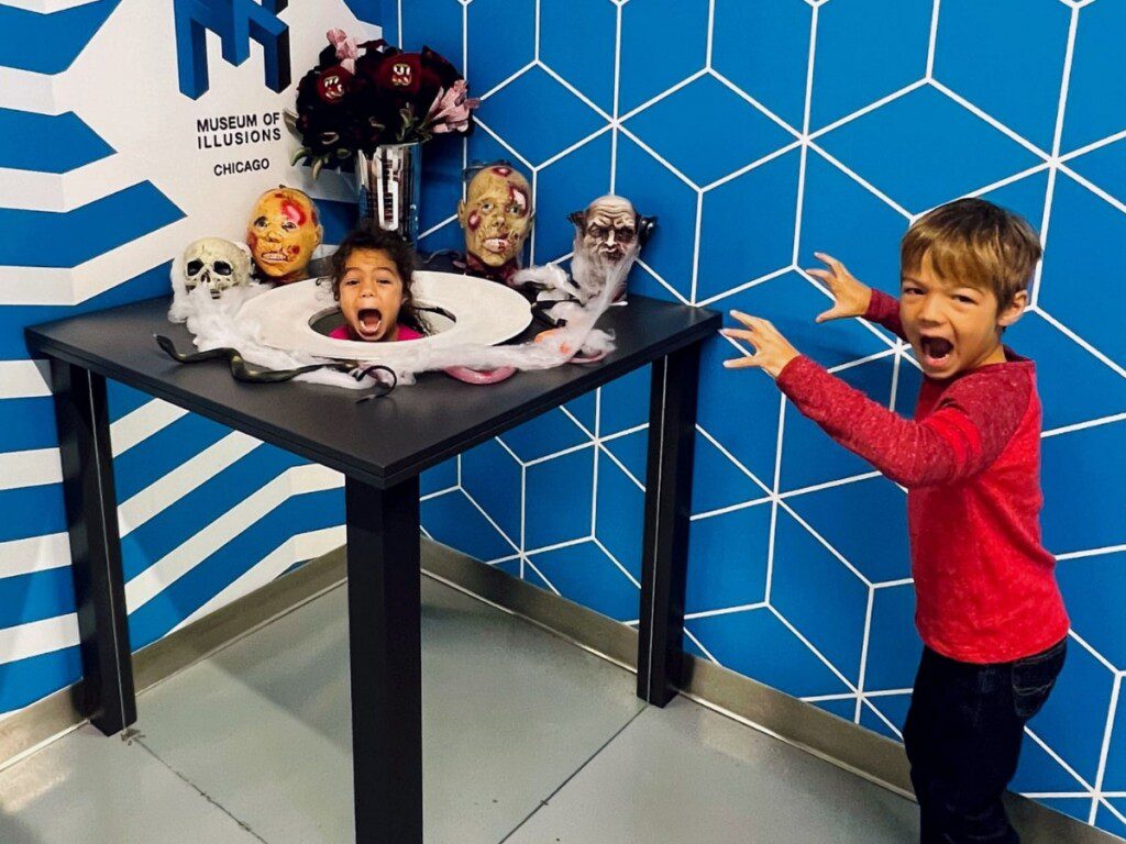Kids exploring optical illusions at Museum of Illusions Chicago