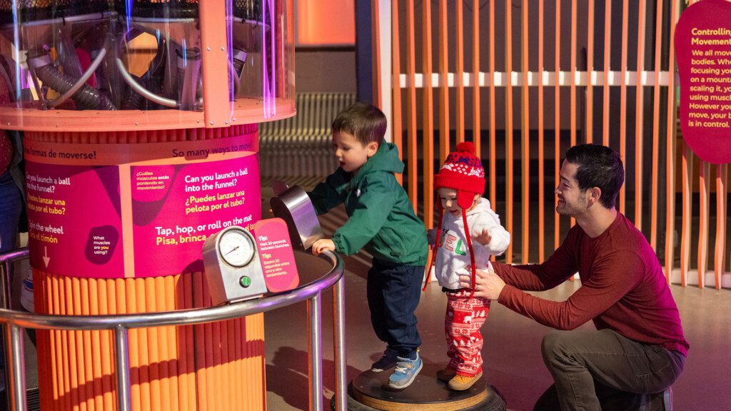 Children playing at a movement exhibit at Pacific Science Center.